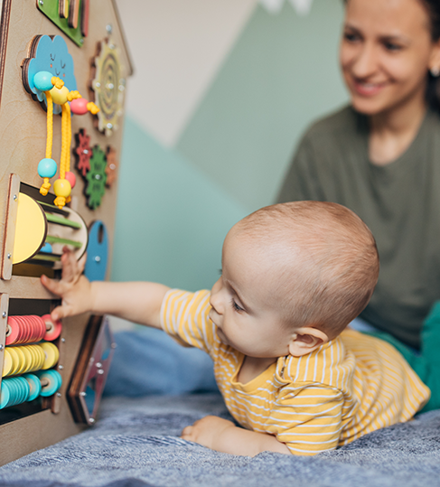 Baby playing with a toy