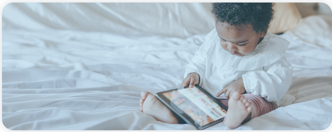 Baby playing with an iPad